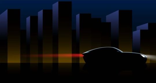 Silhouette di auto sportive con i grattacieli della città vettore  